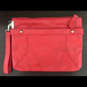 Happy, bright coral clutch from The Limited